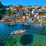 Parga Town Quay with colourful houses and fishing boats
