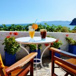 Morning coffee with a view on the cliffs in Skopelos Town