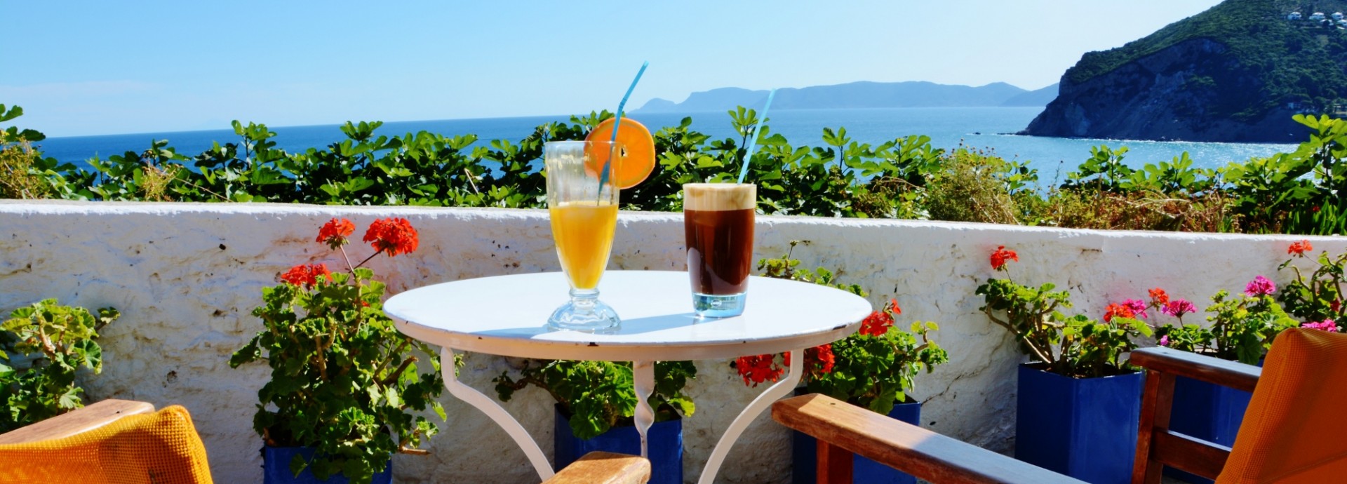 Morning coffee with a view on the cliffs in Skopelos Town