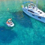 Beneteau 35 anchored in a bay on Kastus Island