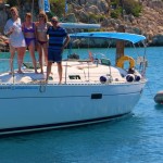 Family anchored in the Saronic Islands by Patrick Bellew