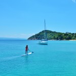 Stand Up Paddle Boarding whilst anchored at Koukounaries Beach on Skiathos Island