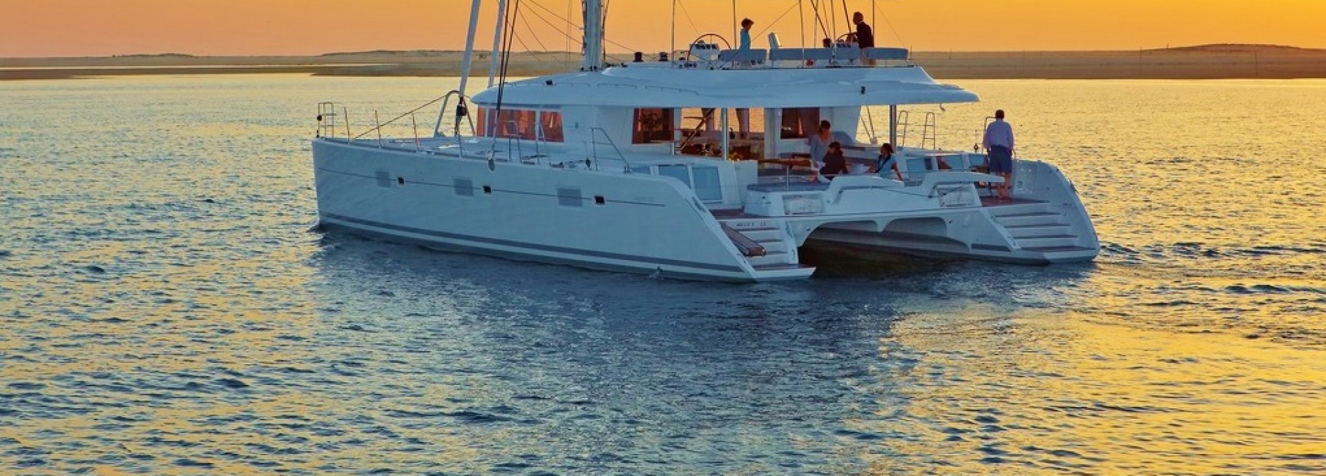 Lagoon 620 Anchored at Sunset